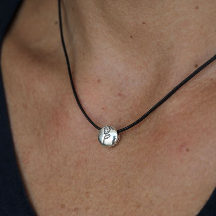 Be Strong with a diamond Black Cord with Sterling Silver Pendant